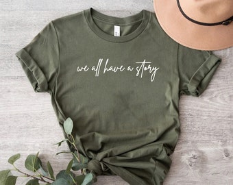 We All Have a Story Shirt, Inspirational Quote Tee, Minimalist Graphic T-Shirt, Positive Message Shirt, Meaningful Gift, Casual Women Tee