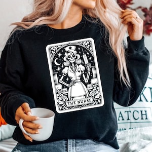 Halloween Nurse Sweatshirt, Nurse Tarot Card Shirt, Funny Skeleton Nurse Shirt, Nursing Sweatshirt, Gift For Nurse, Spooky Nurse Sweater