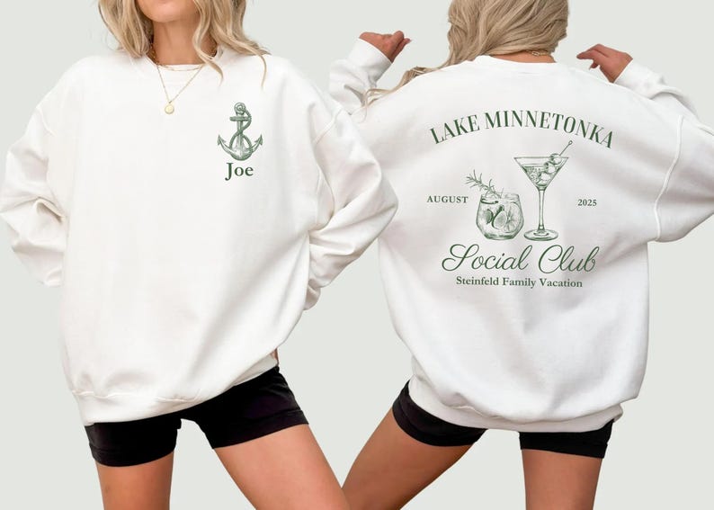 May include: White sweatshirt with a green anchor graphic and the name "Joe". The back of the sweatshirt features a cocktail design with the text "Lake Minnetonka Social Club" and "August 2025".