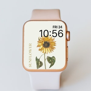 May include: A white Apple Watch with a rose gold band and a sunflower watch face. The watch face displays the time as 10:56 and the date as FRI 24. The text "SUNFLOWER" is displayed vertically on the left side of the watch face.