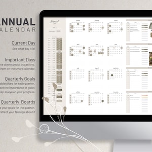 May include: A computer screen displaying a printable annual calendar with sections for current day, important days, quarterly goals, and quarterly boards. The calendar is in a minimalist style with a beige and white color scheme.