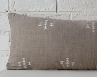 taupe extra long lumbar wool pillow cover. muted woven wool lumbar handwoven throw pillow. bolster pillow. taupe long lumbar pillow