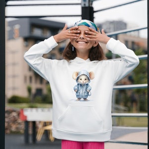 May include: White hoodie with a blue hooded mouse graphic. The hoodie has a kangaroo pocket and a drawstring hood.