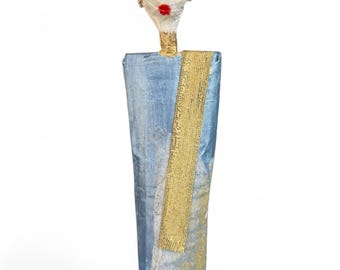 Elegant woman in blue and gold made of papier-mâché, handmade
