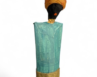 Elegant woman with turban made of papier-mâché, handmade