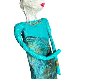 Elegant woman in turquoise made of papier-mâché, handmade