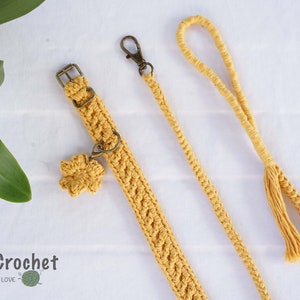 May include: A yellow crocheted dog collar and leash set with a flower charm. The collar has a metal buckle and the leash has a tassel.  MokaCrochet - Handmade with Love.