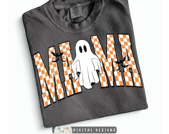 May include: A charcoal gray t-shirt featuring the text MAMA in an orange and white checkered pattern. The letter A is replaced by a white ghost illustration, and small black bats are positioned around the letters on the front of the shirt.