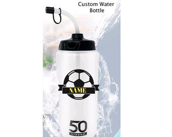 May include: A clear plastic water bottle with a black lid and a black and white soccer ball design. The bottle has a straw and says "NAME" and "50 STRONG" on it.