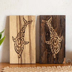 Handcrafted pair of inlaid woodwork dolphins