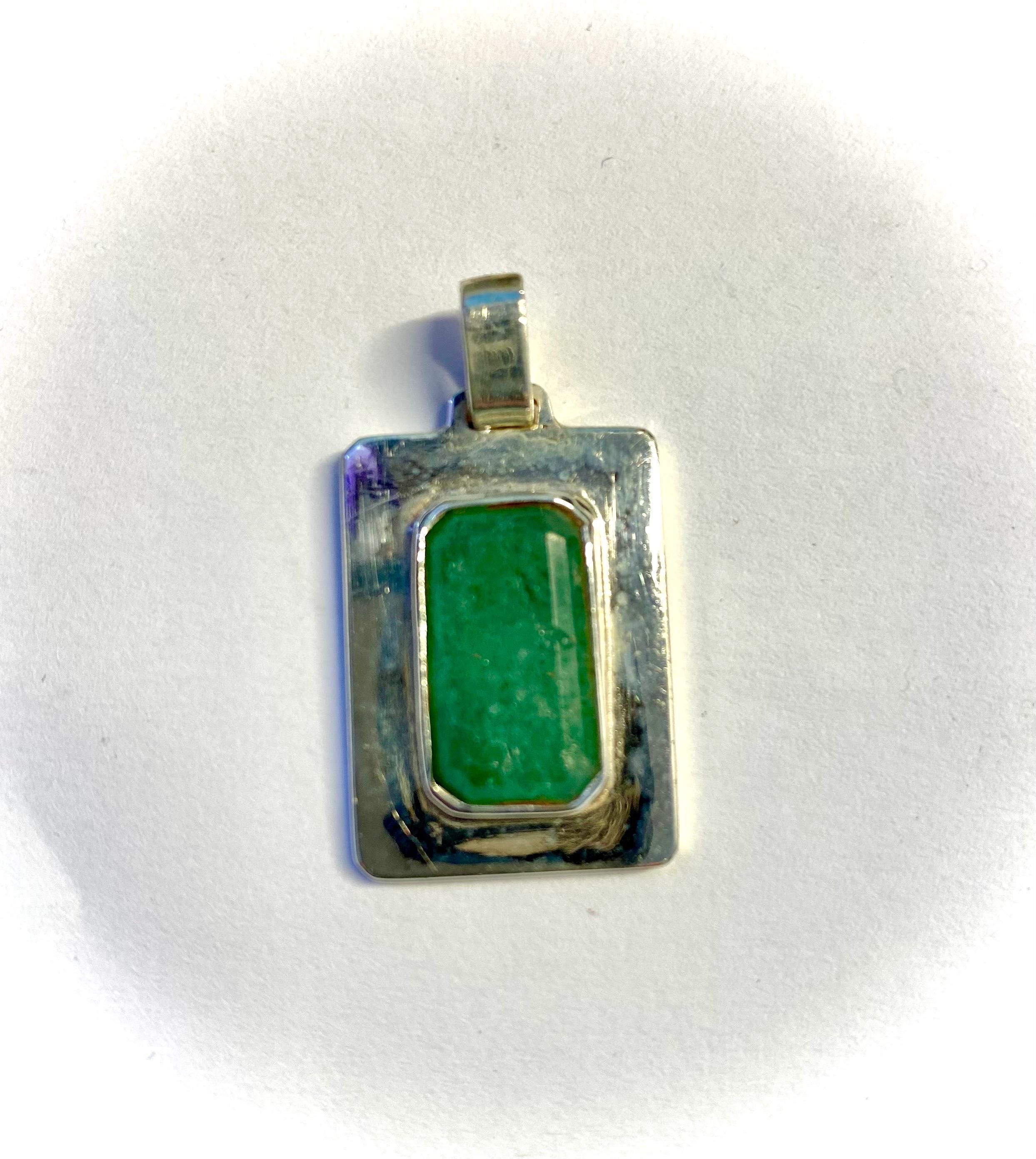 Two magnificent pendants in faceted stones set in silver