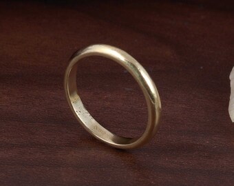 Anillo apilable de oro delicado: banda fina y lisa