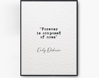 May include: Black and white typography print with the quote "Forever is composed of nows" by Emily Dickinson. The quote is framed in a black frame.