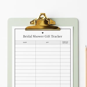 May include: A mint green clipboard with a gold-colored clip holding a white sheet of paper. The paper is a bridal shower gift tracker with columns for guest, gift, and thank you note sent. A pencil is visible on the right side.