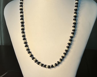 20" Onyx and Freshwater Pearl Necklace with sliver-plated spacers and a lobster claw clasp and matching 7.5" bracelet
