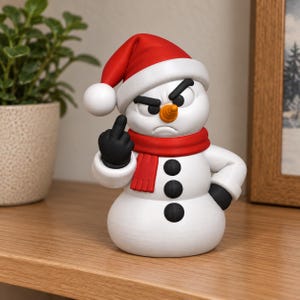 May include: A white snowman figurine wearing a red Santa hat and a red scarf. The snowman has a carrot nose, black eyes with an angry expression, and three black buttons on its torso. One hand is raised, displaying a middle finger gesture.