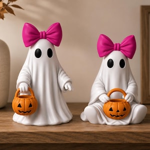 Cute spooky ghost STL files for Halloween displays featuring pumpkin buckets and charming bow accents.