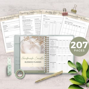 May include: A light blue business planner with a white and gold cover featuring a candle and the text "Handmade Candle Business Planner". The planner is open to a page with a table labeled "Customer Satisfaction Rate". The planner is surrounded by office supplies, including a gold pen, tape, and paper clips.