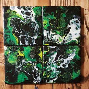 Fluid Art Coaster Set of 4 in Black, Yellow, Green and a White swipe.   Glows in Black Light.