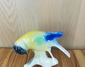 Figura de pájaro de porcelana