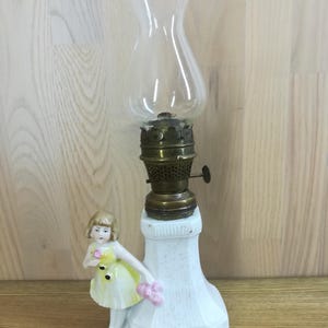 Kerosene Lamp with Girls Figurine