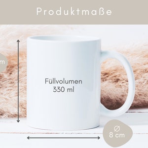 May include: White ceramic mug with a black text that says "Fullvolumen 330 ml". The mug is 9.5 inches tall and 8 inches wide.