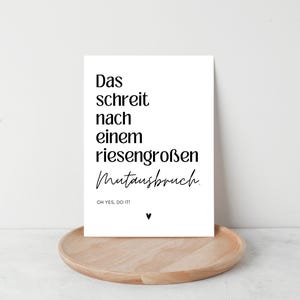 May include: A white card with black text that reads "Das schreit nach einem riesengro&szlig;en Mutansbruch. Oh YES, DO IT!!" with a small heart symbol at the bottom.
