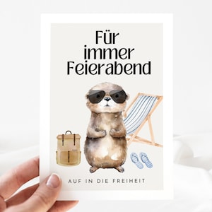 May include: A card with a cartoon otter wearing sunglasses and a backpack. The text on the card reads "F&uuml;r immer Feierabend" and "AUF IN DIE FREIHEIT".
