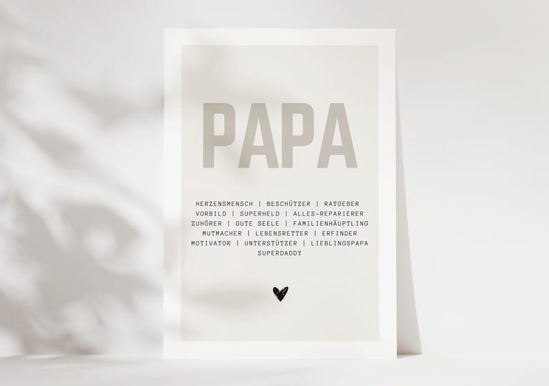 May include: A printable poster with the word "PAPA" in large, beige letters. Below the word are a series of words describing a father, such as "protector", "advisor", and "superhero", all in smaller, beige letters.