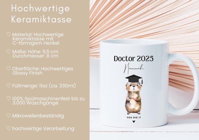 May include: White ceramic mug with a graduation cap otter illustration and the text "Doctor 2025 Hannah You Did It". The mug is 9.5 cm tall and 8 cm in diameter.