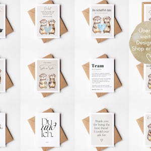 May include: A collection of greeting cards with otter illustrations. The cards feature various messages in German and English, with watercolor-style otter designs holding hearts and other objects. The cards are on a white surface with brown envelopes.