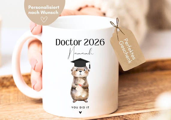 Doktor Geschenk, Doktor Tasse mit Otter Motiv Doktor 2026 you did it, Doktor bestanden, Promotion, Geschenke Doktortitel - Hej.Otti®