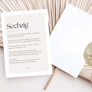 May include: A beige postcard with the word "Sechzig" printed in black. The postcard has text in German and a small smiley face at the bottom. A blank white card is next to it.