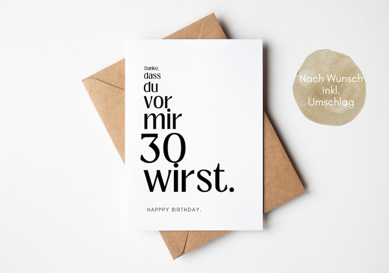 May include: A white card with black text that reads "Danke, dass du vor mir 30 wirst. HAPPY BIRTHDAY."  The card is sitting on a brown envelope. The text "Nach Wunsch inkl. Umschlag" is printed on the envelope.
