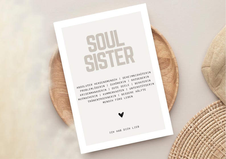 May include: A printable poster with the words "Soul Sister" in large, bold letters. The poster lists qualities of a soul sister, such as "absolute heart person", "secret keeper", "problem solver", "listener", "advisor", "crisis manager", "good soul", "counselor", "encourager", "grief box", "supporter", "tear dryer", "better half", and "person for life". The poster also includes the phrase "I love you" in German.