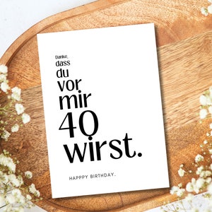 May include: A white card with black text that reads "Danke, dass du vor mir 40 wirst." Happy Birthday.