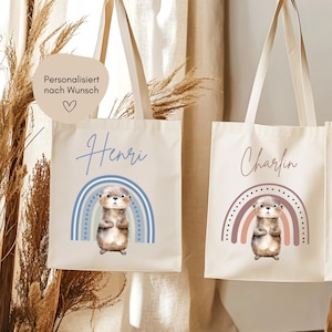 Hej.Otti® Sac personnalisé pour enfants avec arc-en-ciel et jolie loutre, sac en tissu avec nom pour garderie, inscription scolaire, maternelle