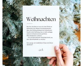 May include: A white card with the word "Weihnachten" in black text. The card has a quote about the holiday season, including the words "Last-Minute-Geschenkeinkaufen", "Weihnachtsbaum", "Lichterketten", "Plätzchenbackens", and "Adventskalender".