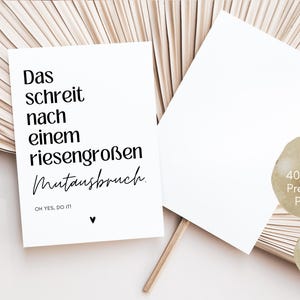 May include: A white postcard with black text that reads "Das schreit nach einem riesengro&szlig;en Mutausbruch. OH YES, DO IT!" The postcard is made from 400g/m2 premium paper and is DIN A6 size.