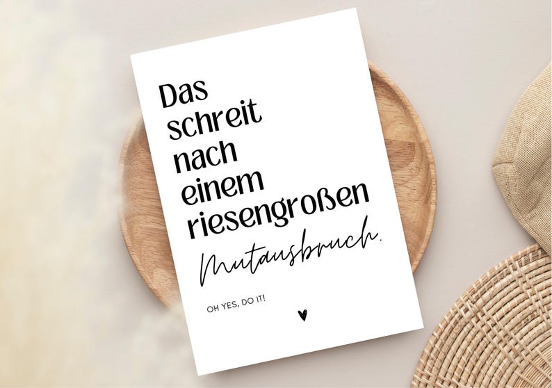 May include: A white card with black text that reads "Das schreit nach einem riesengro&szlig;en Mutansbruch. OH YES, DO IT!" with a small black heart at the bottom.