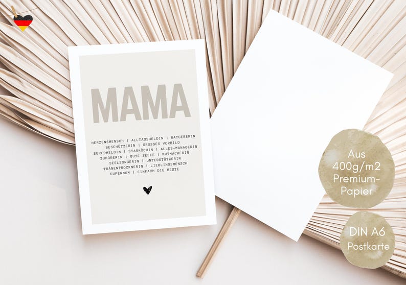 May include: A beige card with the word "MAMA" in large, bold letters. Below the word are a list of positive adjectives describing a mother, such as "protector", "superhero", and "listener". The card is printed on 400g/m2 premium paper and is a DIN A6 postcard.