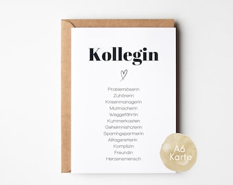 May include: A white card with black text that reads "Kollegin" with a heart symbol and a list of positive attributes, such as "Problemlöserin", "Zuhörerin", "Krisenmanagerin", "Mutmacherin", "Weggefährtin", "Kummerkasten", "Geheimnishüterin", "Sparringspartnerin", "Alltagsretterin", "Komplizin", "Freundin", "Herzensmensch". The card is labelled "A6 Karte" in the bottom right corner.