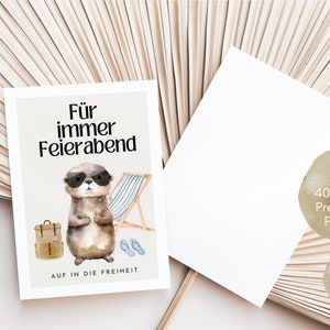 May include: A postcard with a cartoon otter wearing sunglasses and a backpack, with the text "F&uuml;r immer Feierabend" and "AUF IN DIE FREIHEIT". The postcard is printed on 400g/m2 premium paper and is DIN A6 size.