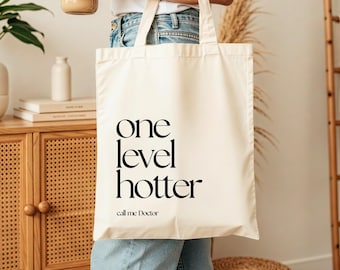 Gepersonaliseerde jute tas voor promotieonderzoek 2026, promotie behaald, promotiegeschenk, geslaagd doctoraatsexamen, PhD loulala®