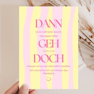 May include: A rectangular greeting card featuring vertical wavy stripes in pale yellow and light pink. The card displays the German text: DANN ist es wohl jetzt soweit. Alle sagen: Bitte GEH nicht. Und DOCH müssen wir es nun ohne dich schaffen. Wir wünschen dir von Herzen das Allerbeste. A small smiley face icon is printed at the bottom.