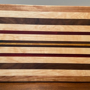 Maple, walnut, mulberry, cherry and padauk cutting board.  16&quot; X 12&quot;.