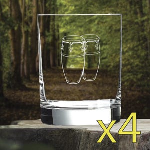 May include: A clear glass tumbler featuring a white etched graphic of two conga drums. The design shows the drums side by side with visible hardware details. The glass has a thick, solid base and straight sides, presented as a set of four items.