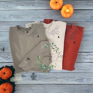 Geborduurd spiderweb-sweater, spiderweb-sweater, halloween-sweater, halloween, geborduurd spinnenweb, spookachtig seizoen, spinnenweb,