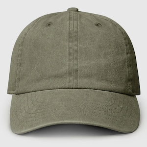 May include: A plain, olive green baseball cap with a curved brim.