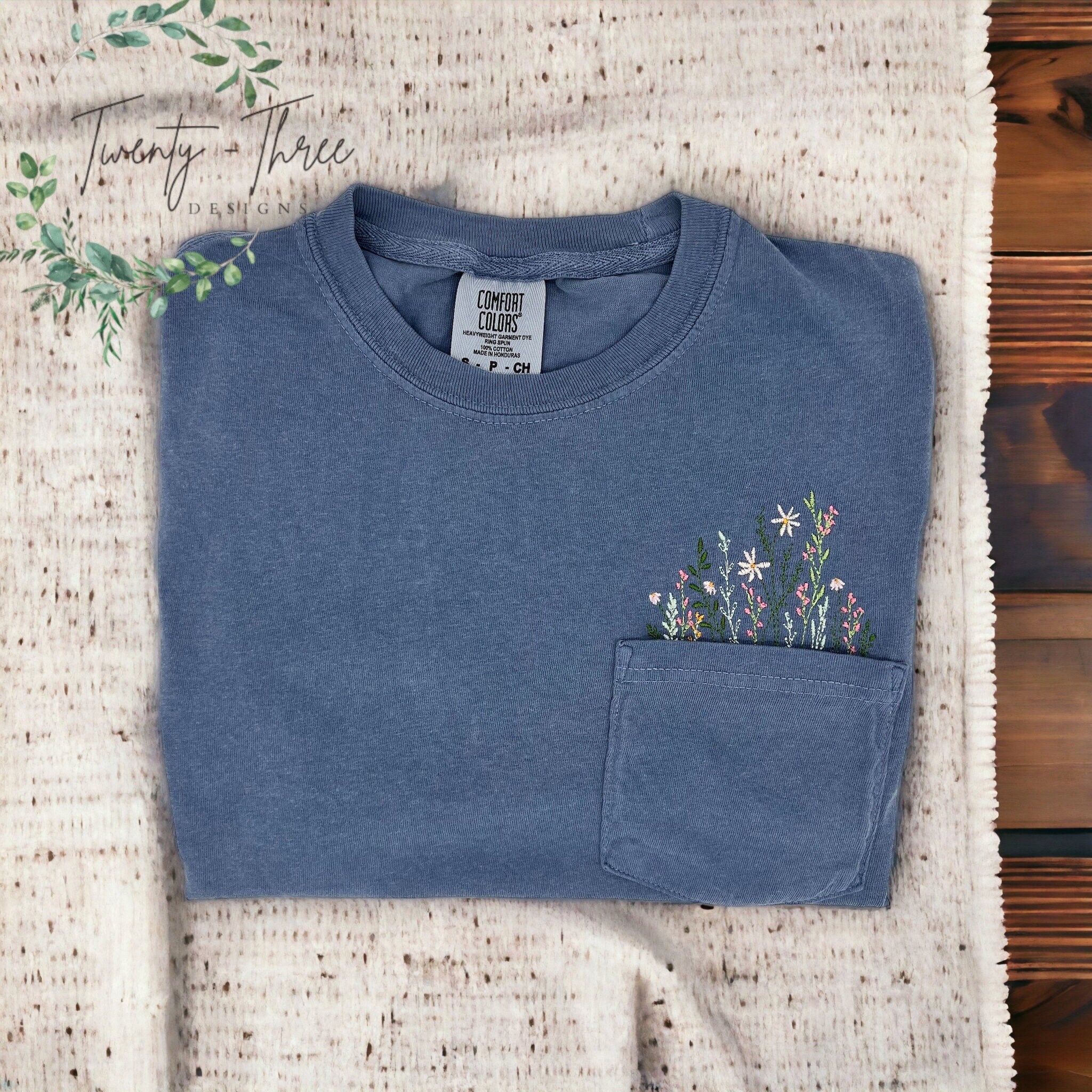 Embroidered crewneck wildflower pocket t shirt Embroidered flower